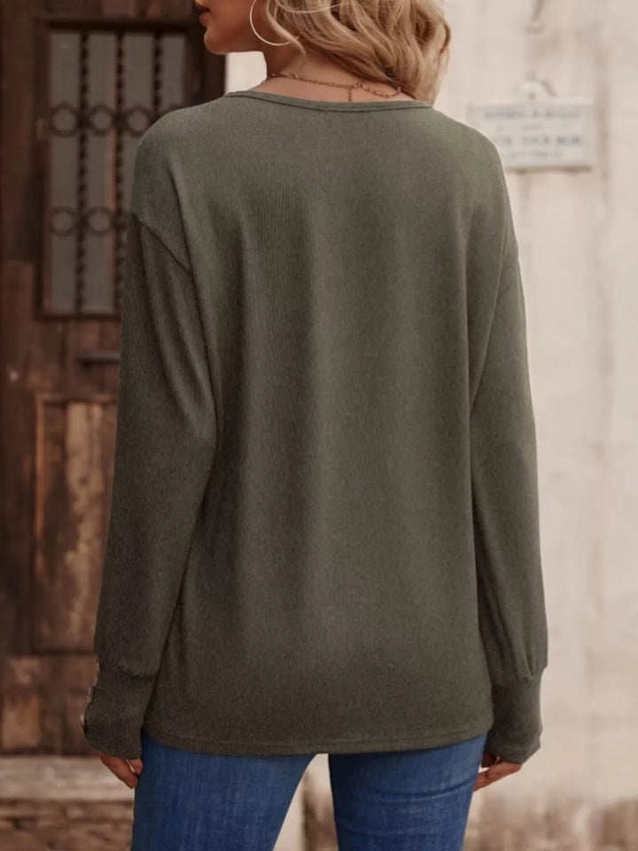 V-neck long sleeve top with button cuffs