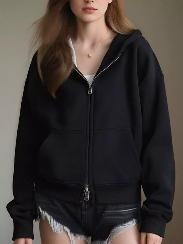 Black Zip-up hoodie with front pockets and ribbed cuffs
