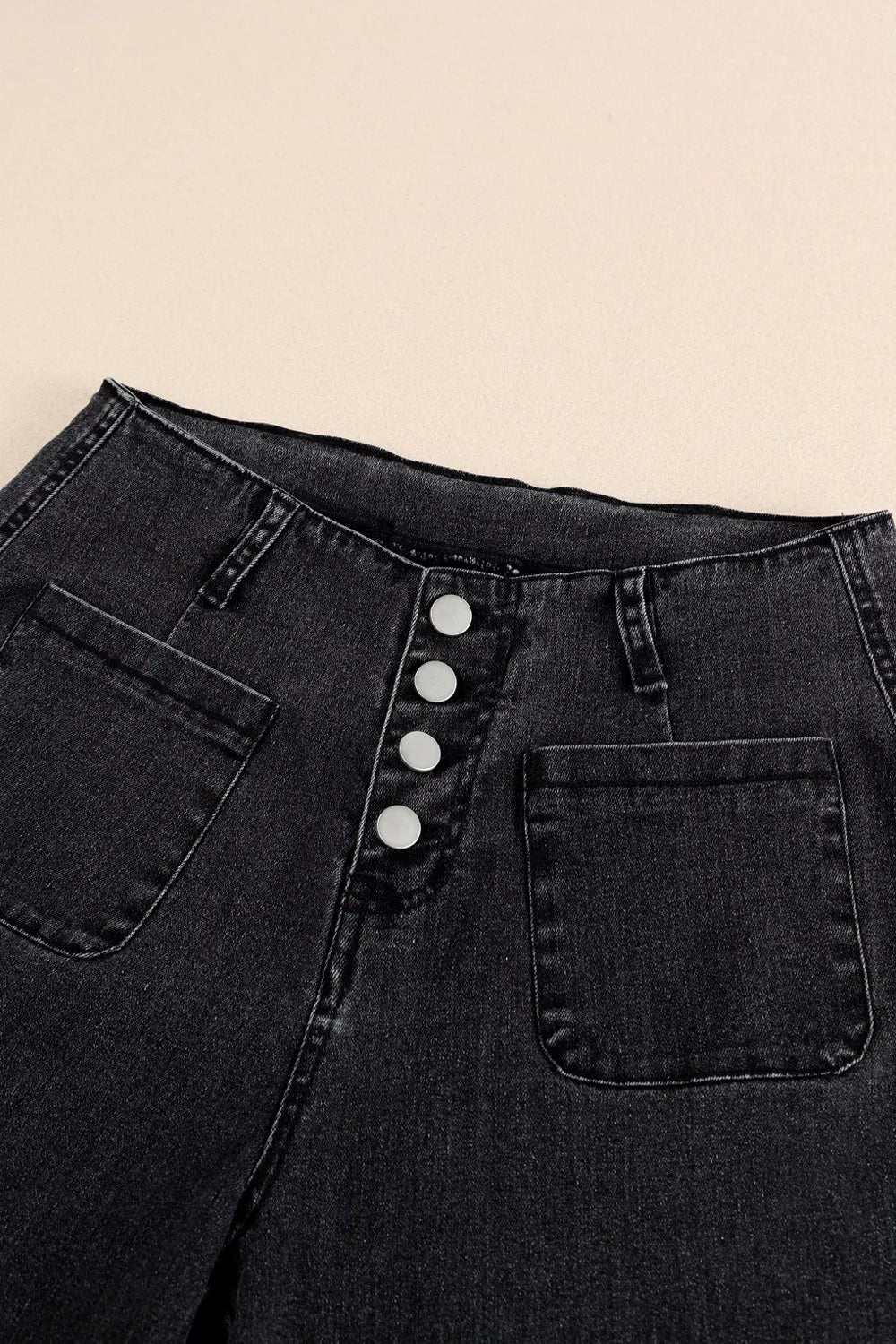 High-rise button-fly wide-leg jeans with patch pockets