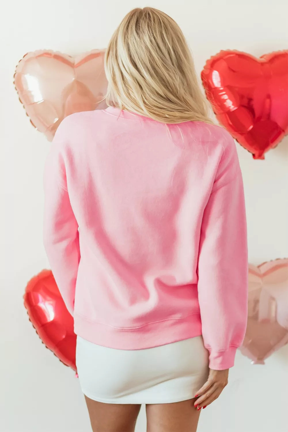 Floral XOXO graphic crewneck sweatshirt with bow hearts