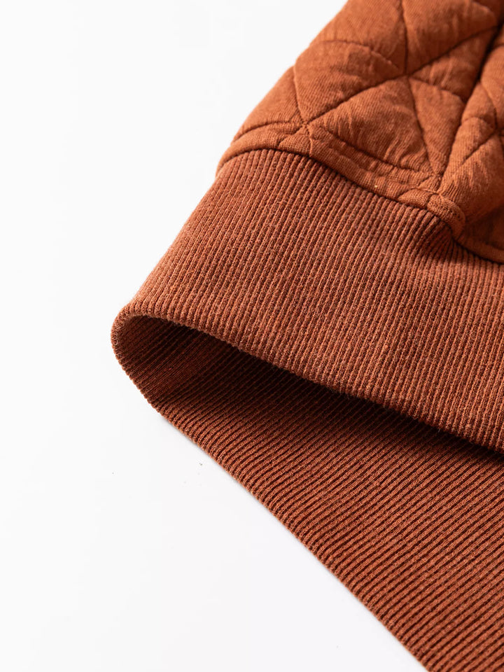 Geometric quilted half-zip pullover sweatshirt