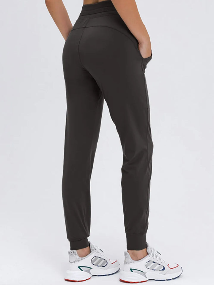 Tapered stretch nylon joggers with drawstring waist and pockets