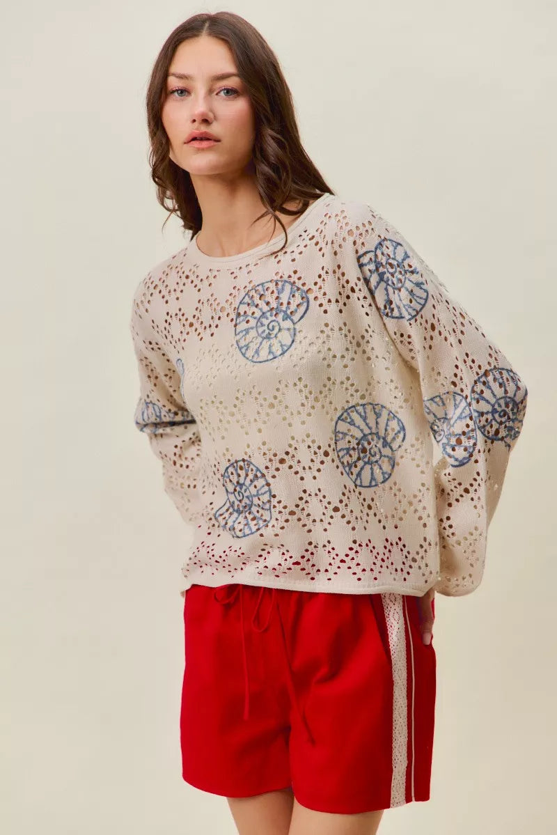 Seashell motif openwork knit long sleeve top