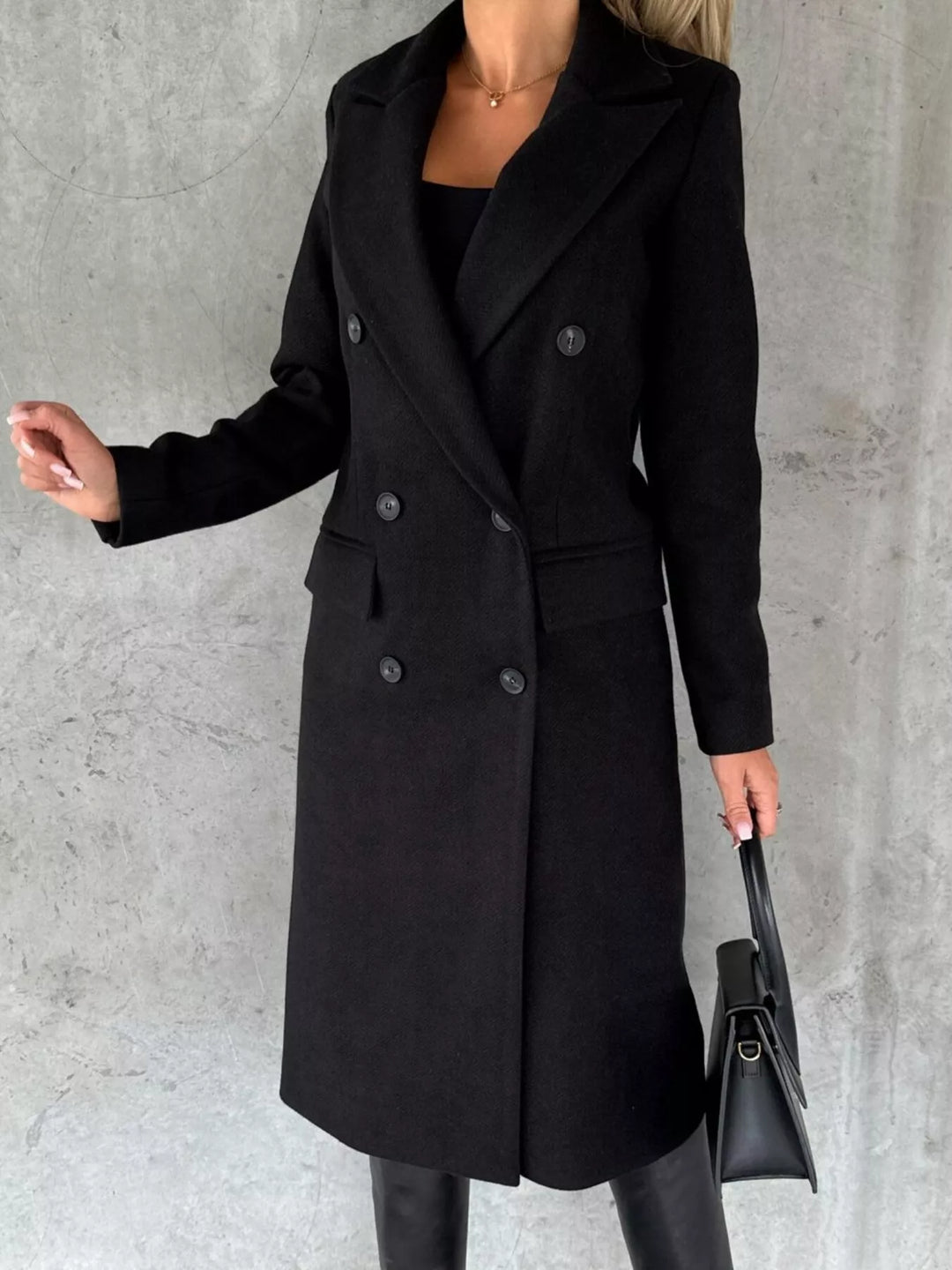 Double-breasted longline coat with notch lapel and flap pockets