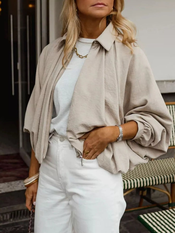 Oversized zip-up bomber jacket with collar and pockets
