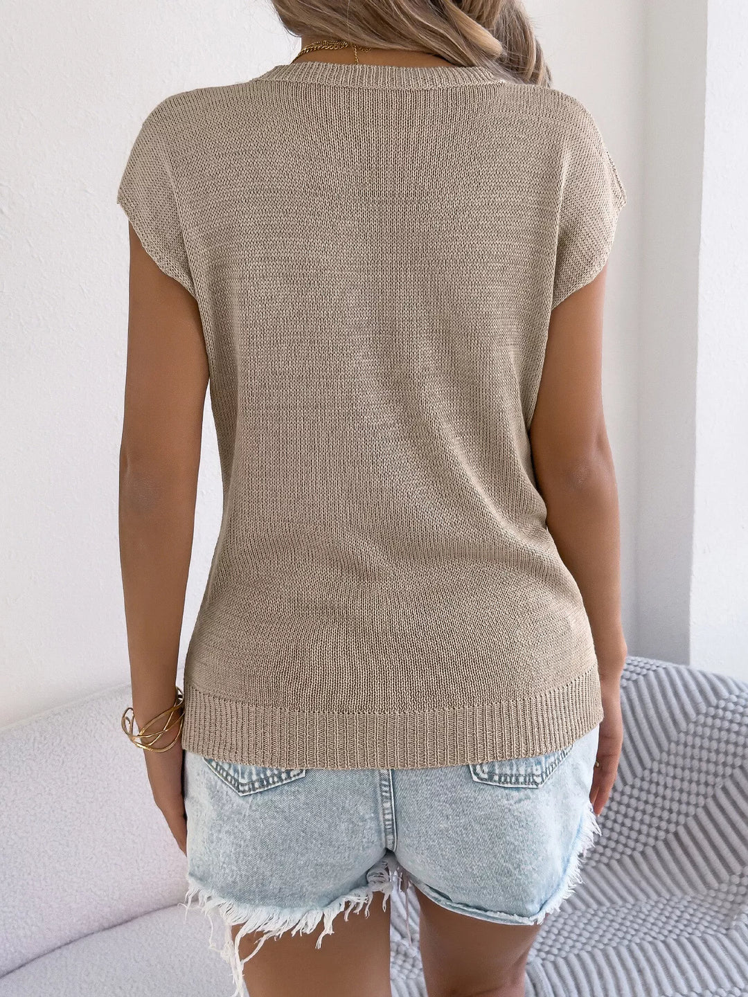 Cable knit openwork cap sleeve sweater
