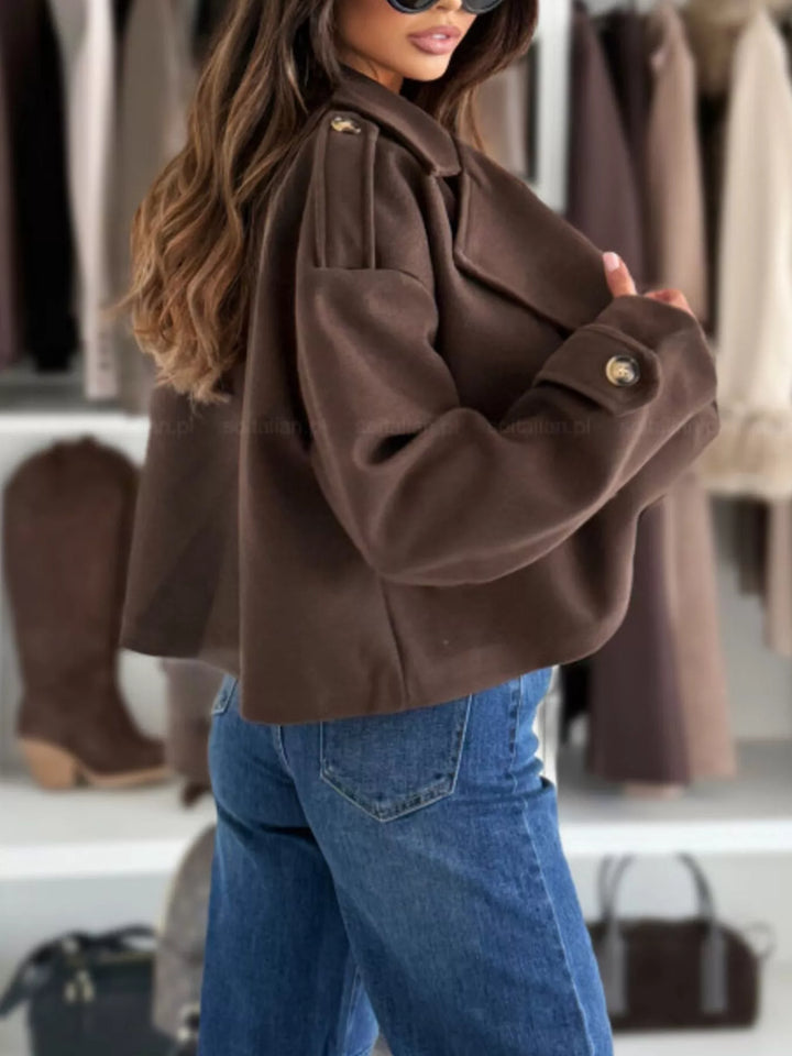 Double-breasted cropped coat with notch lapels and button cuffs