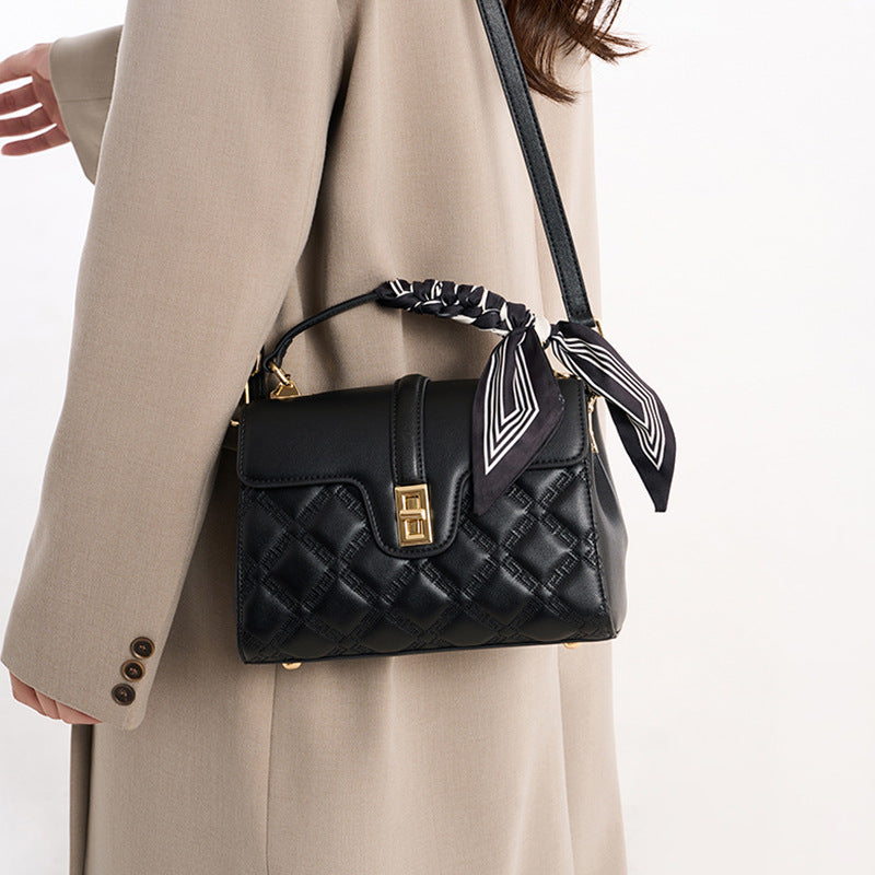 Quilted faux leather crossbody bag with scarf top handle