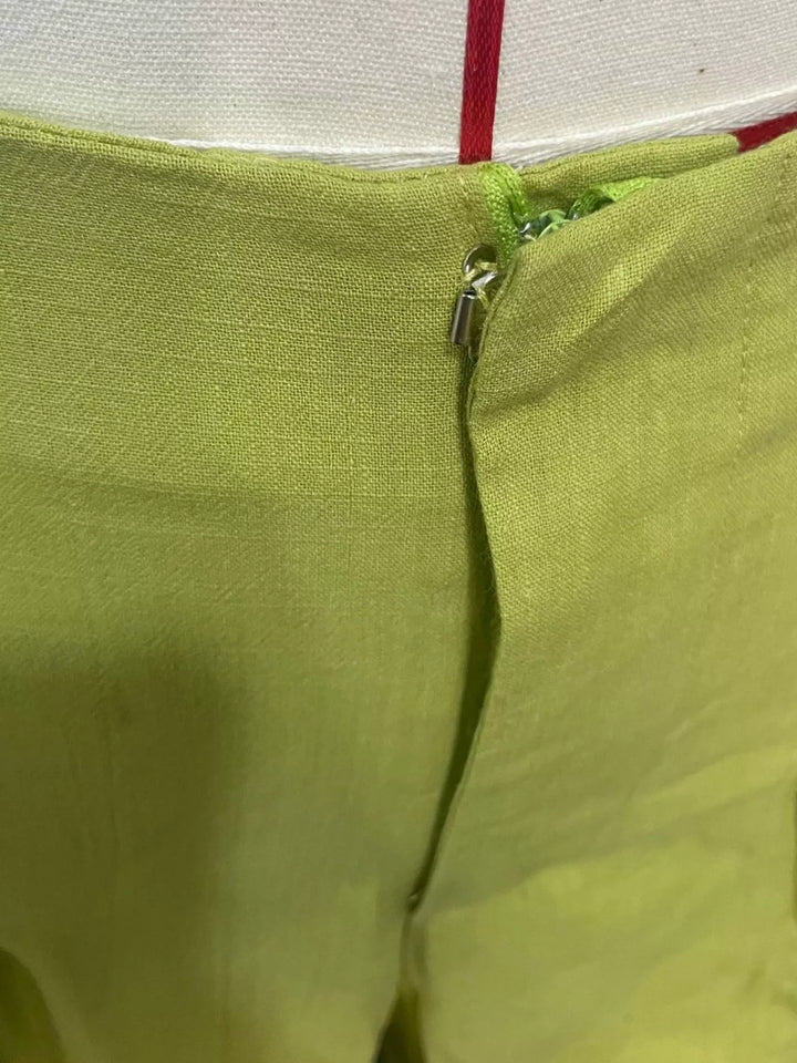 Pleated high-rise wide-leg pants with pockets