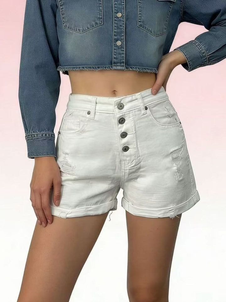 White High-rise distressed denim shorts with button fly and rolled hem
