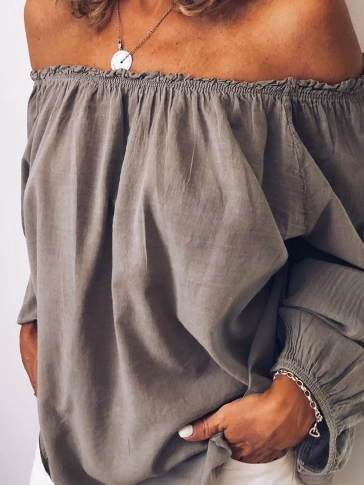 Off-shoulder ruffle-neck blouse with long puff sleeves
