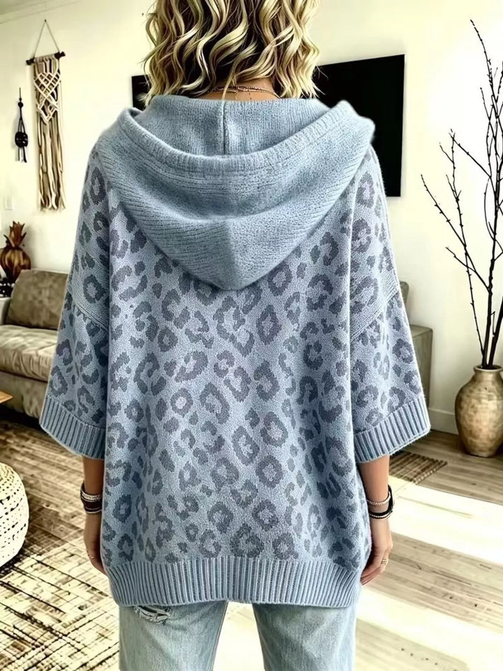 Leopard print drawstring hooded sweater with dolman sleeves