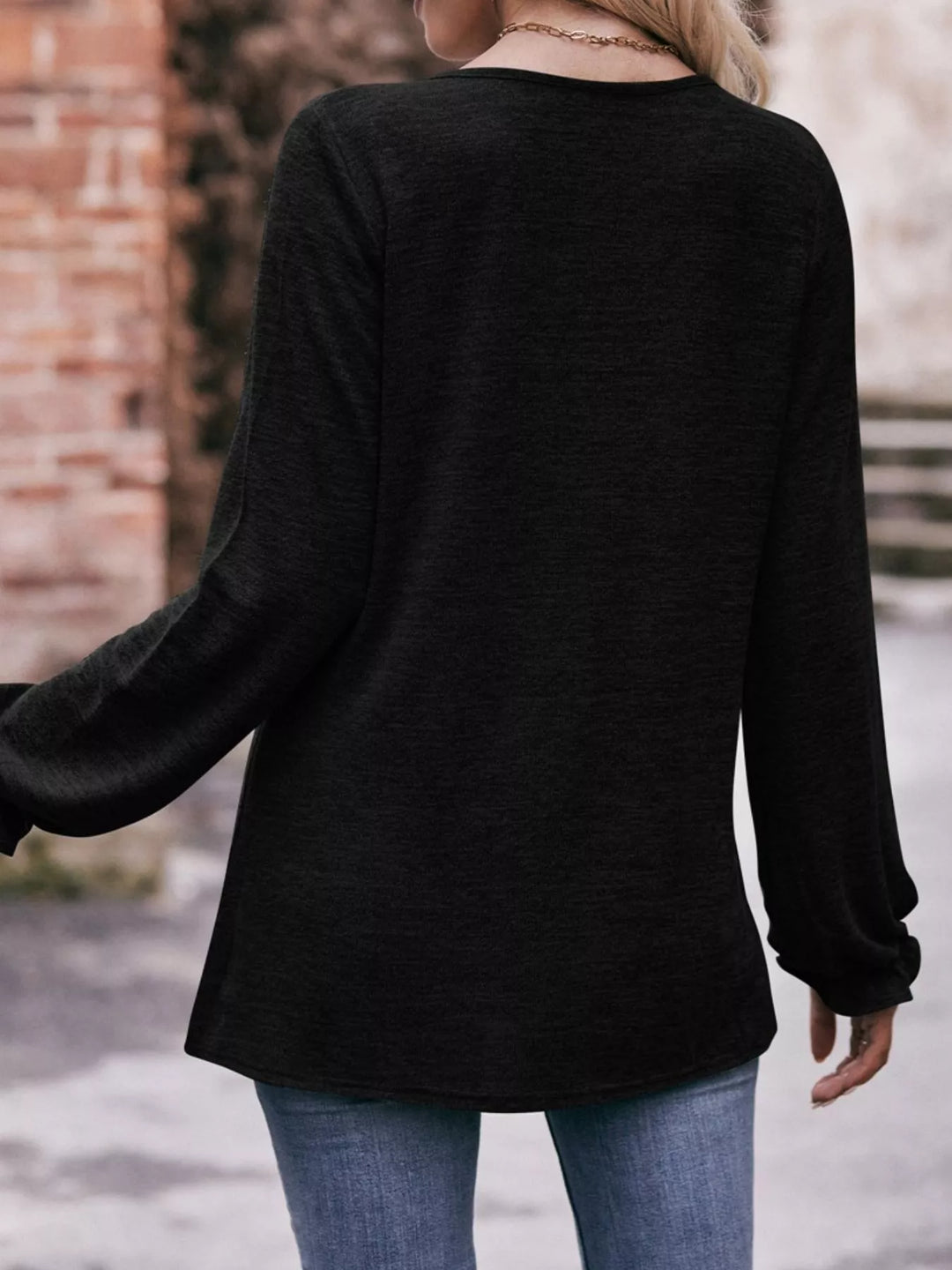 Ruffle cuff long sleeve top with pleated neckline