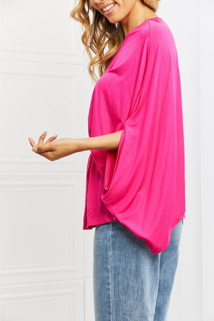 One-shoulder top with dolman sleeve and cinched waist