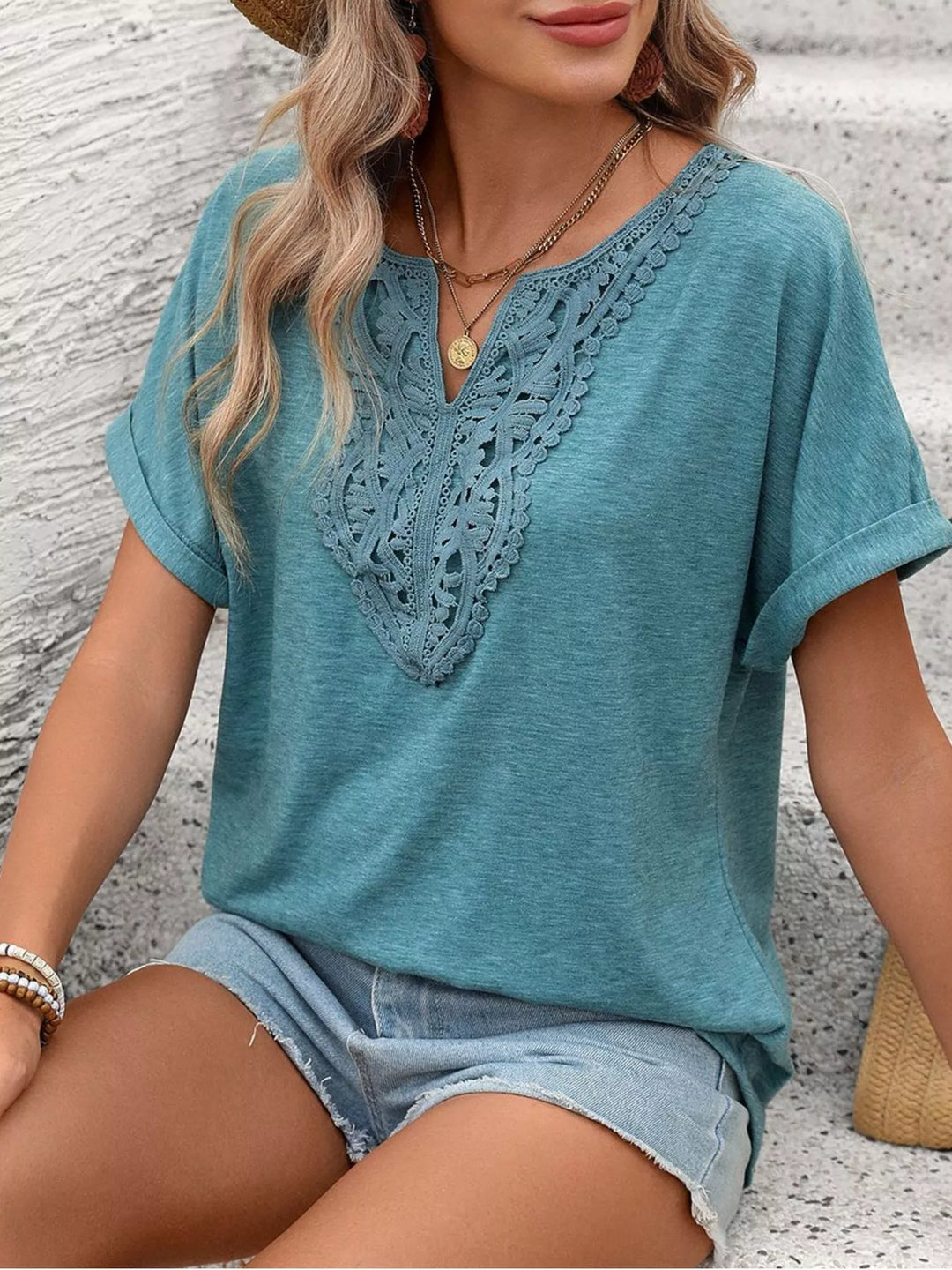 Lace-trim V-neck short sleeve top with rolled cuffs