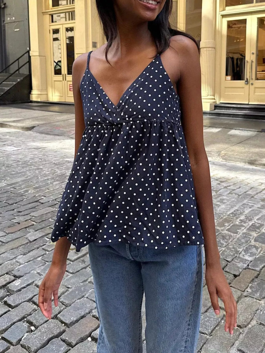 Polka dot v-neck babydoll cami with twist front