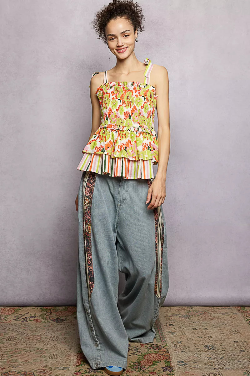 Floral smocked cami with tiered peplum and tie shoulder straps