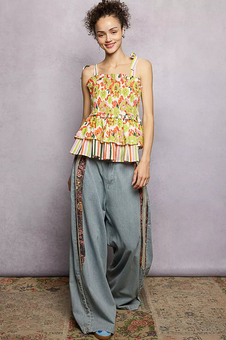 Floral smocked cami with tiered peplum and tie shoulder straps