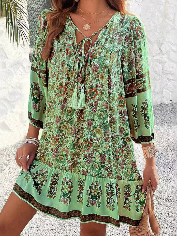 Matcha Green Boho floral v-neck mini dress with tassel tie and long sleeves