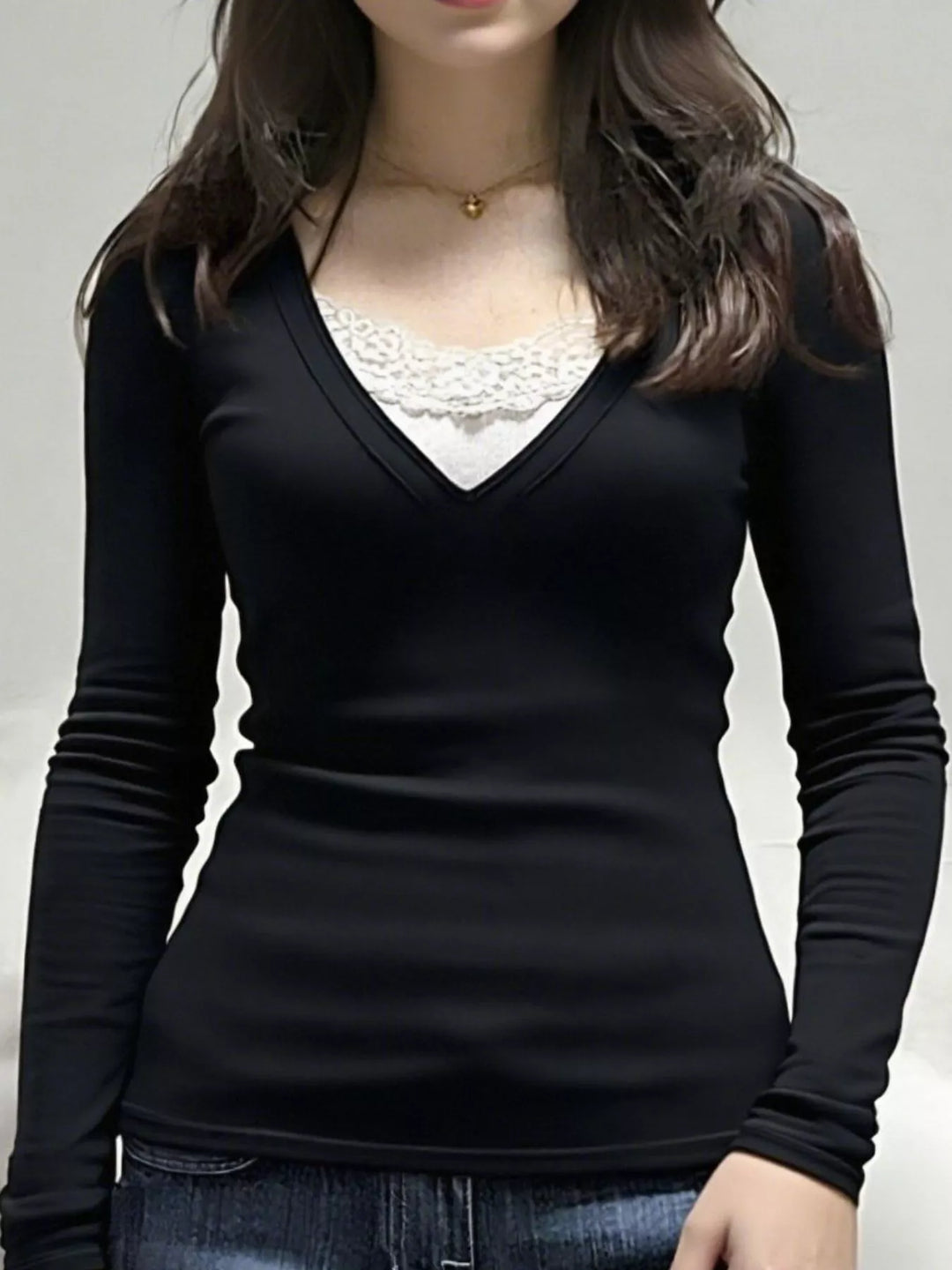 Long sleeve V-neck top with lace trim neckline