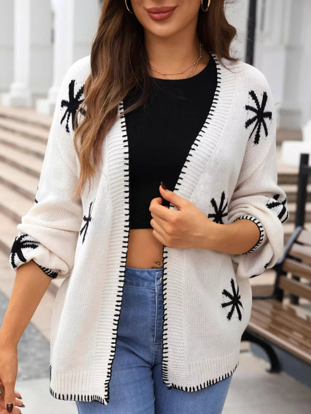 Floral open front knit cardigan with whipstitch trim