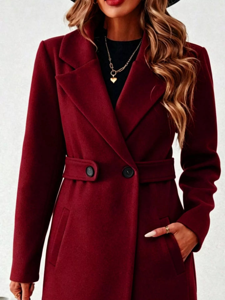 Notched lapel belted longline coat with side pockets