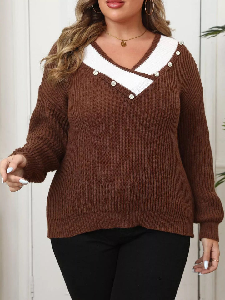 Ribbed knit V-neck sweater with contrast trim and pearl buttons