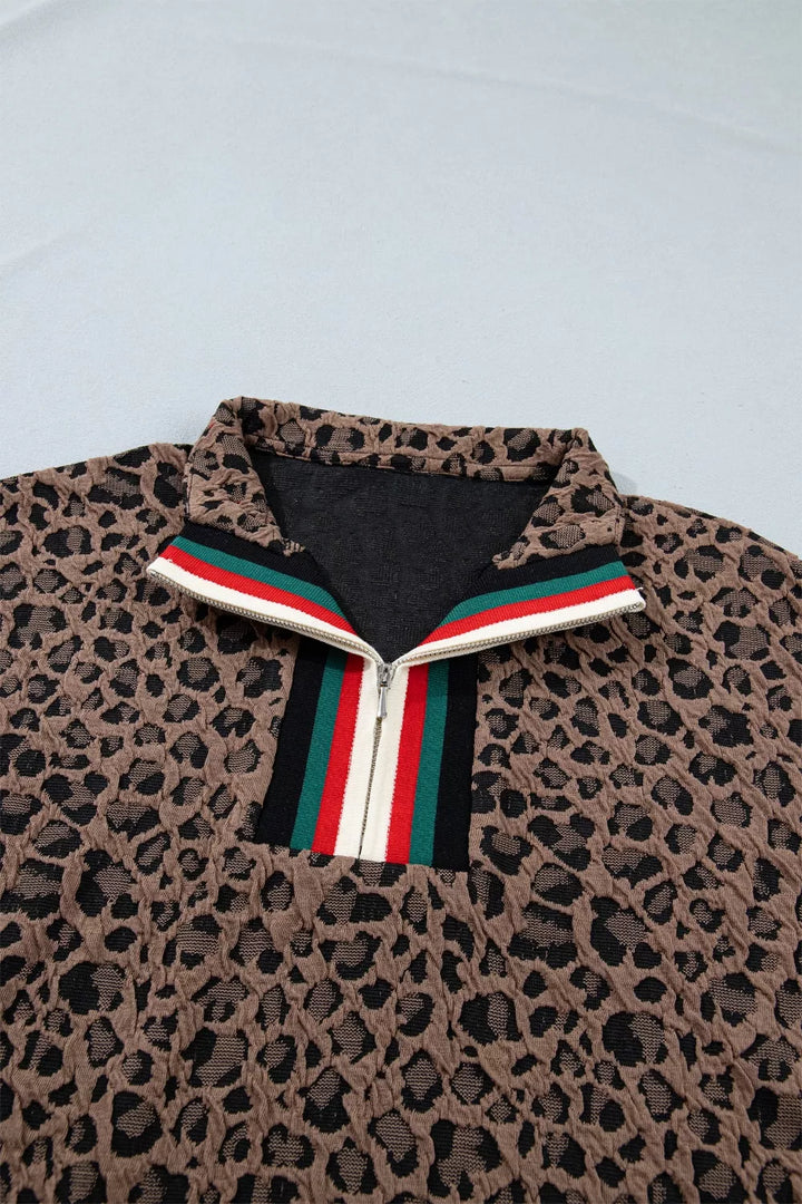 Leopard half-zip short sleeve top with striped collar and cuffs