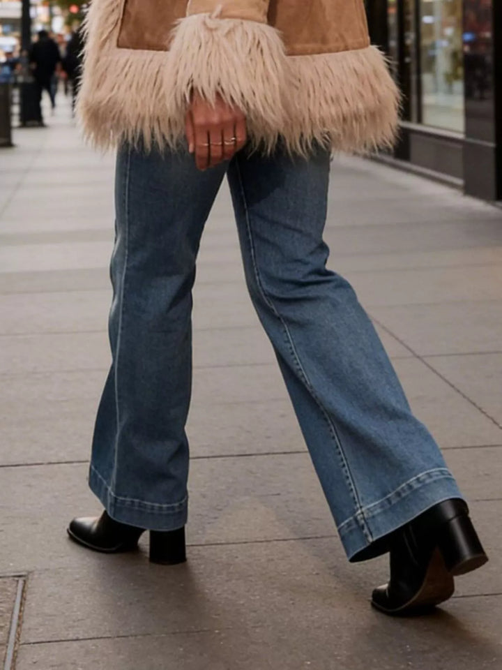 High-rise flare leg jeans with pressed center seam