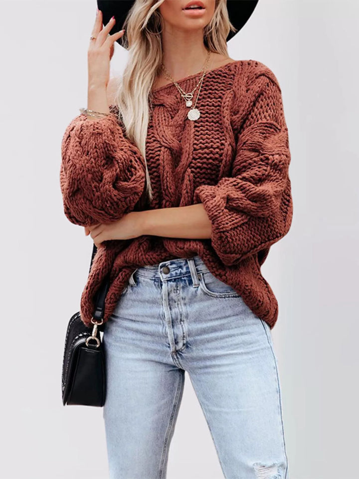Oversized chunky cable knit pullover with wide boat neck