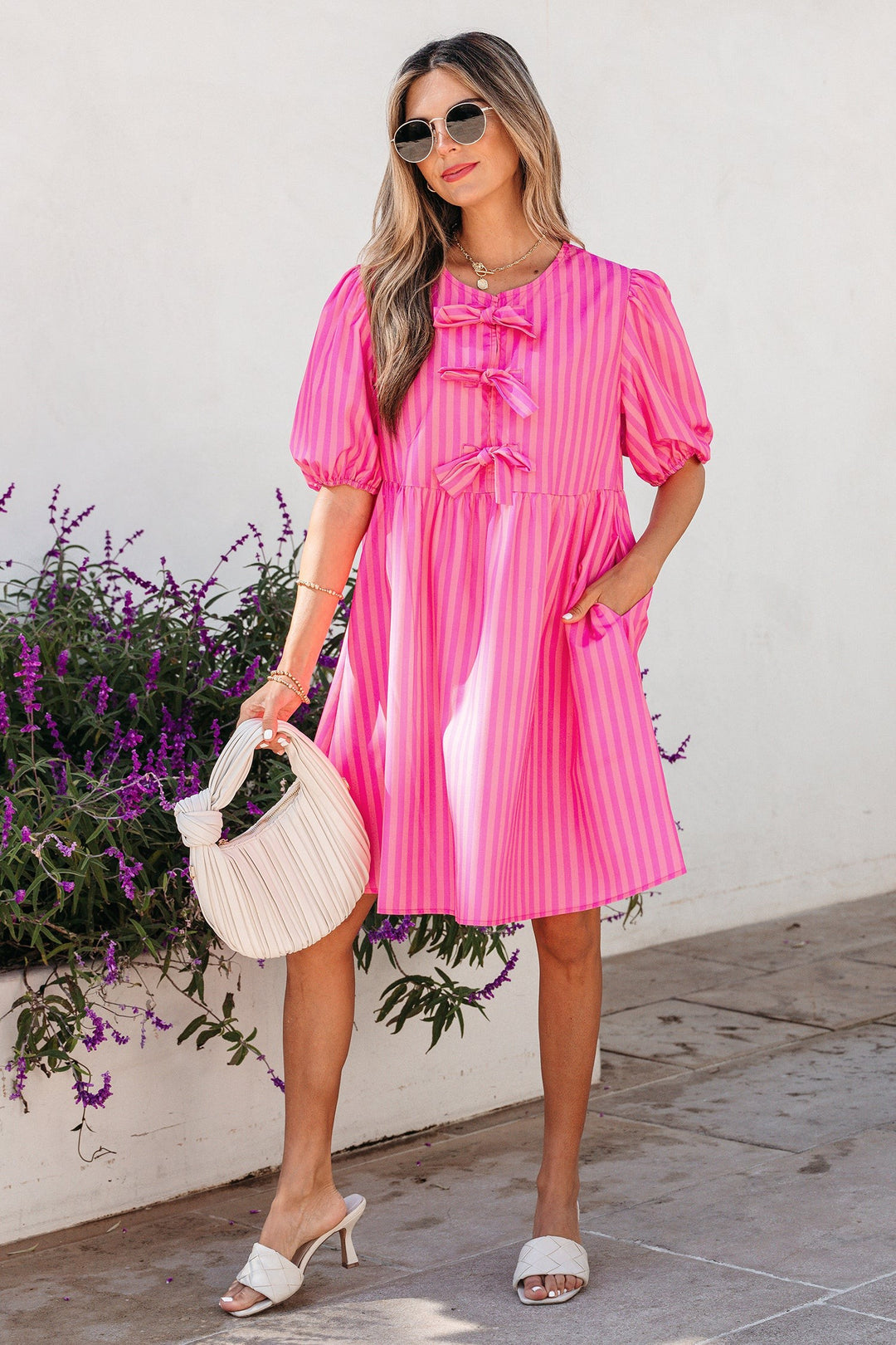 Striped puff sleeve mini dress with triple bow front