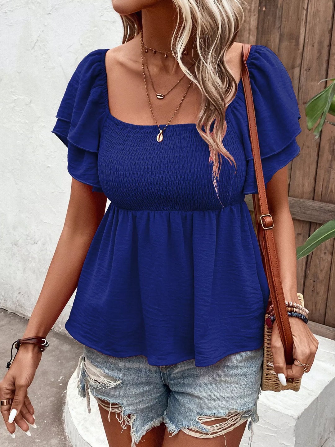 Smocked square neck blouse with ruffle cap sleeves