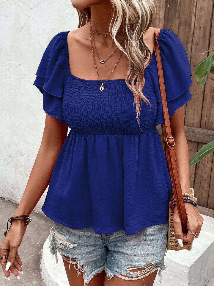 Smocked square neck blouse with ruffle cap sleeves