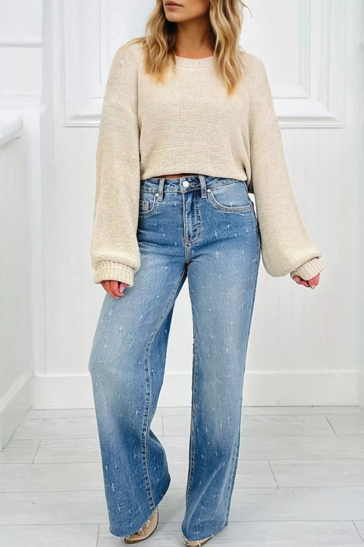 Distressed wide-leg jeans with tummy control and raw hem