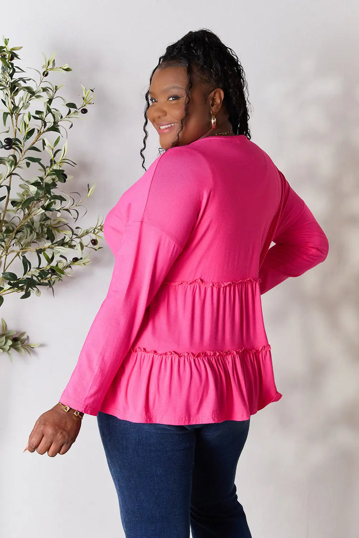 Half-button long sleeve blouse with tiered ruffle hem