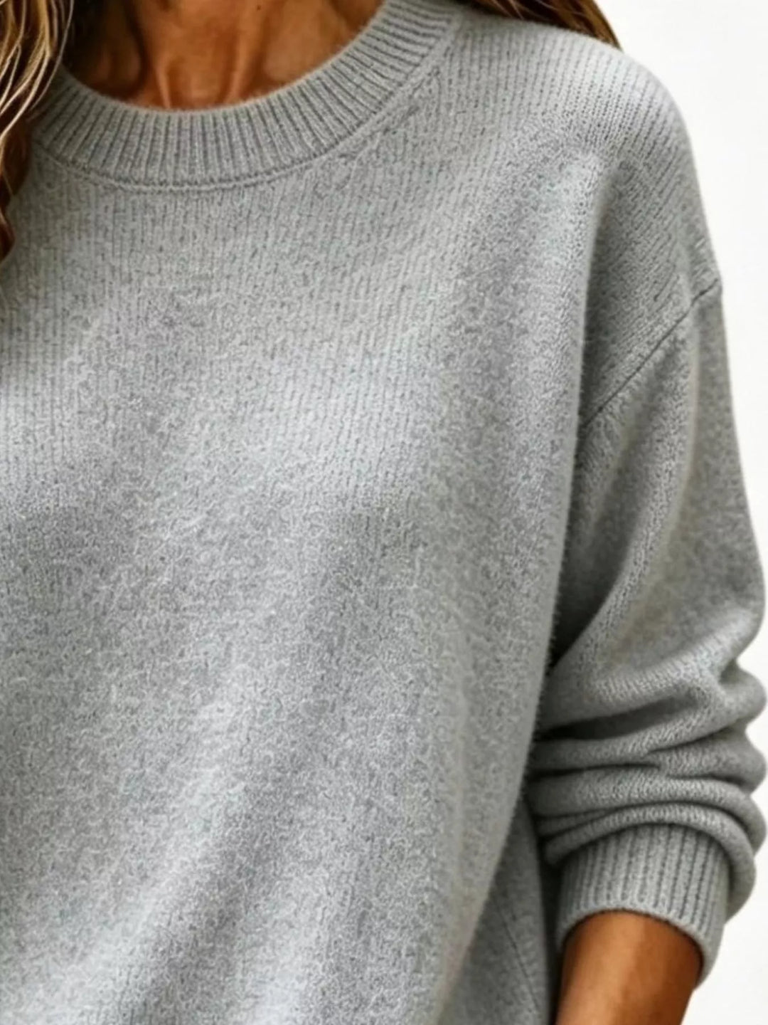 Soft brushed knit sweater with ribbed cuffs and drop shoulders