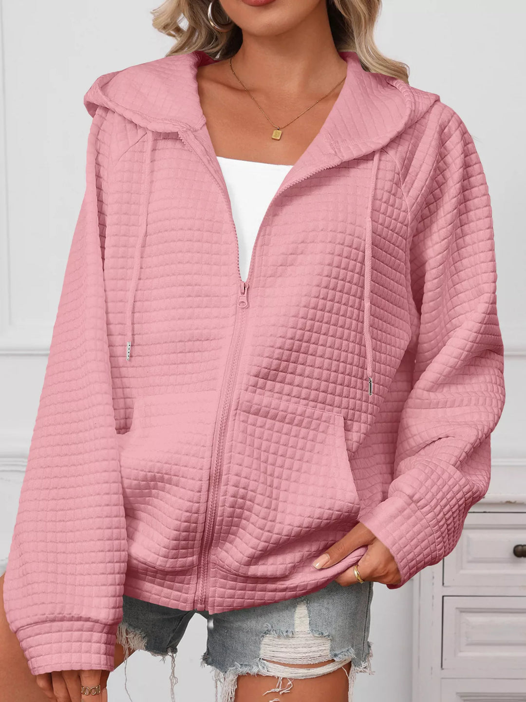 Textured quilted zip-up hooded jacket with pockets