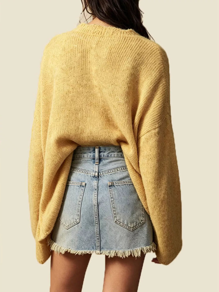 Oversized V-neck button-down knit cardigan with textured trim
