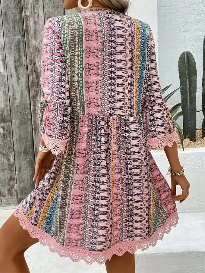 Boho printed mini dress with lace trim and bell sleeves