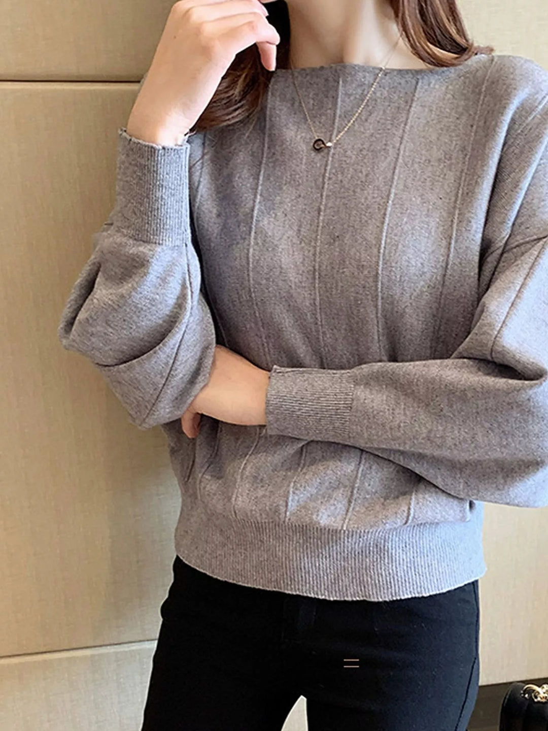 Boat neck batwing sleeve knit pullover with ribbed hem