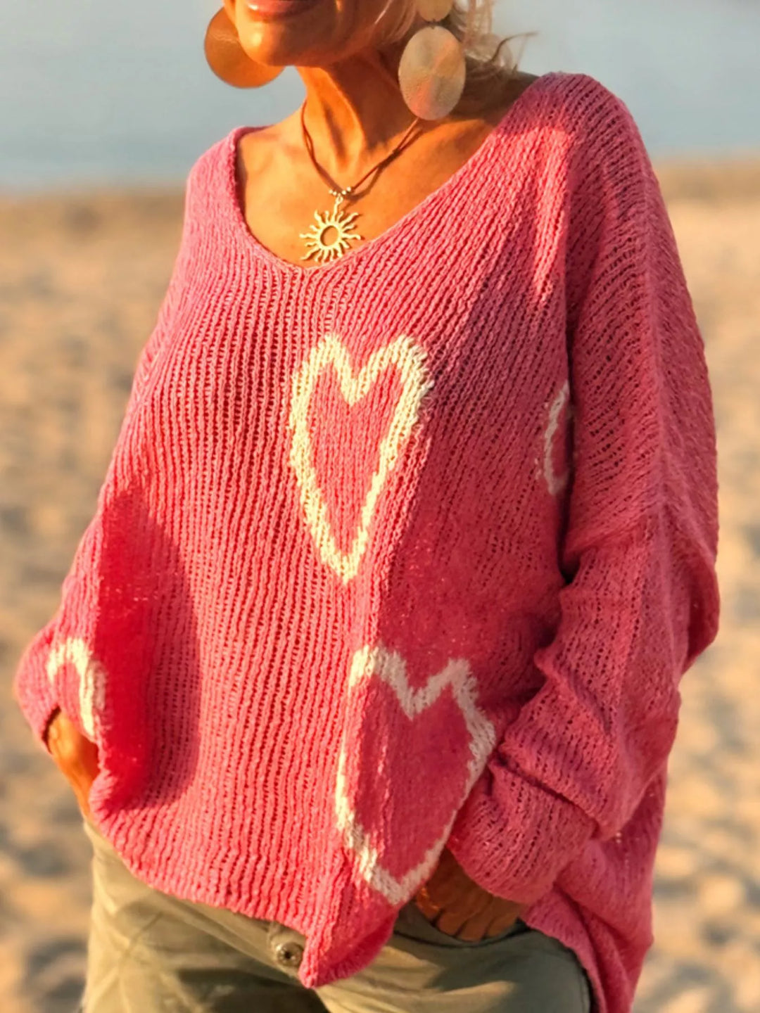 Heart motif V-neck dropped-shoulder knit sweater