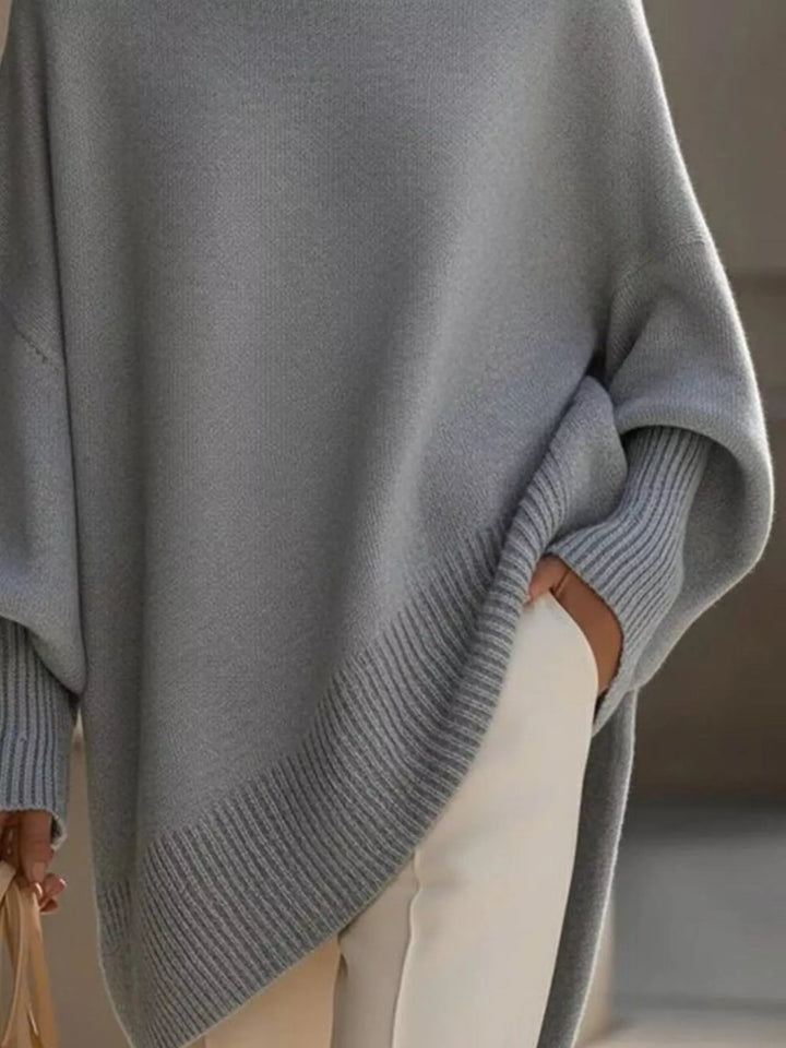 Batwing sleeve oversized sweater with asymmetric hem