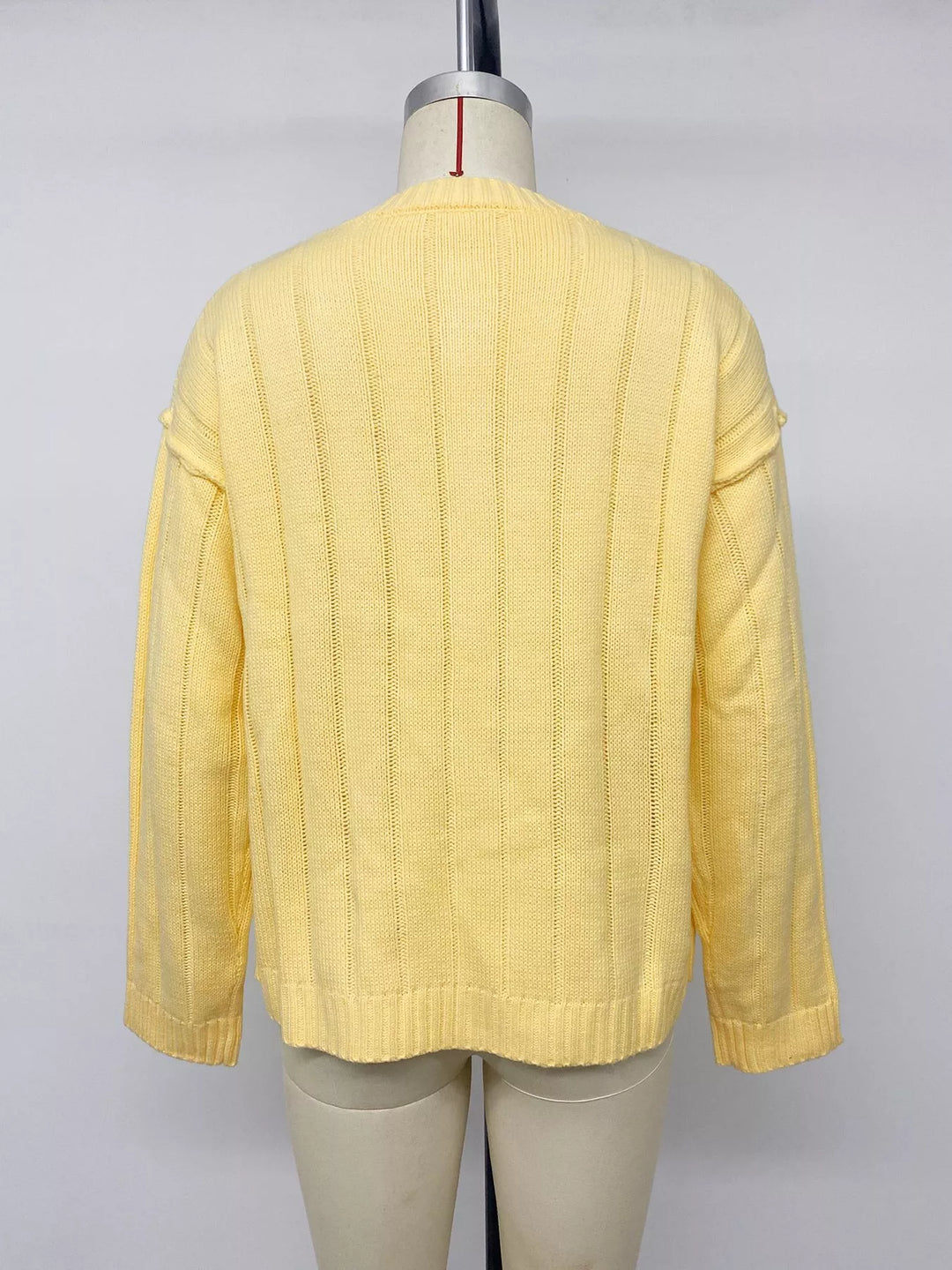 Ribbed knit button-front cardigan with dropped shoulders