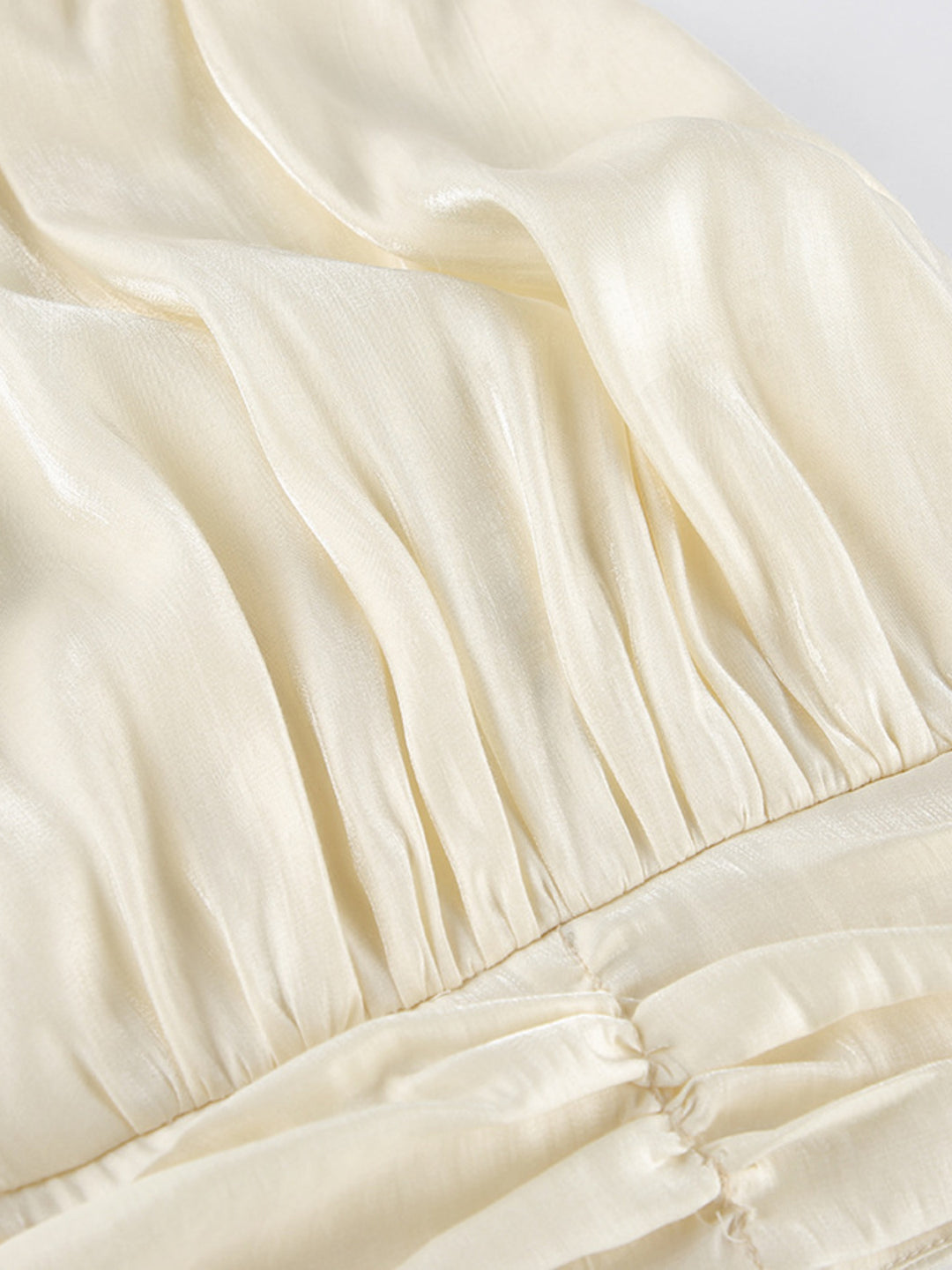 Ruched satin halter top with mock neck and gathered waist