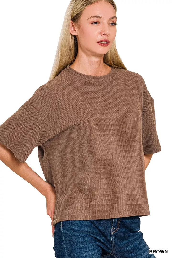 Waffle knit short sleeve top with high-low hem and side slits