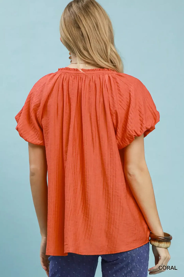 Relaxed gathered V-neck top with flutter sleeves