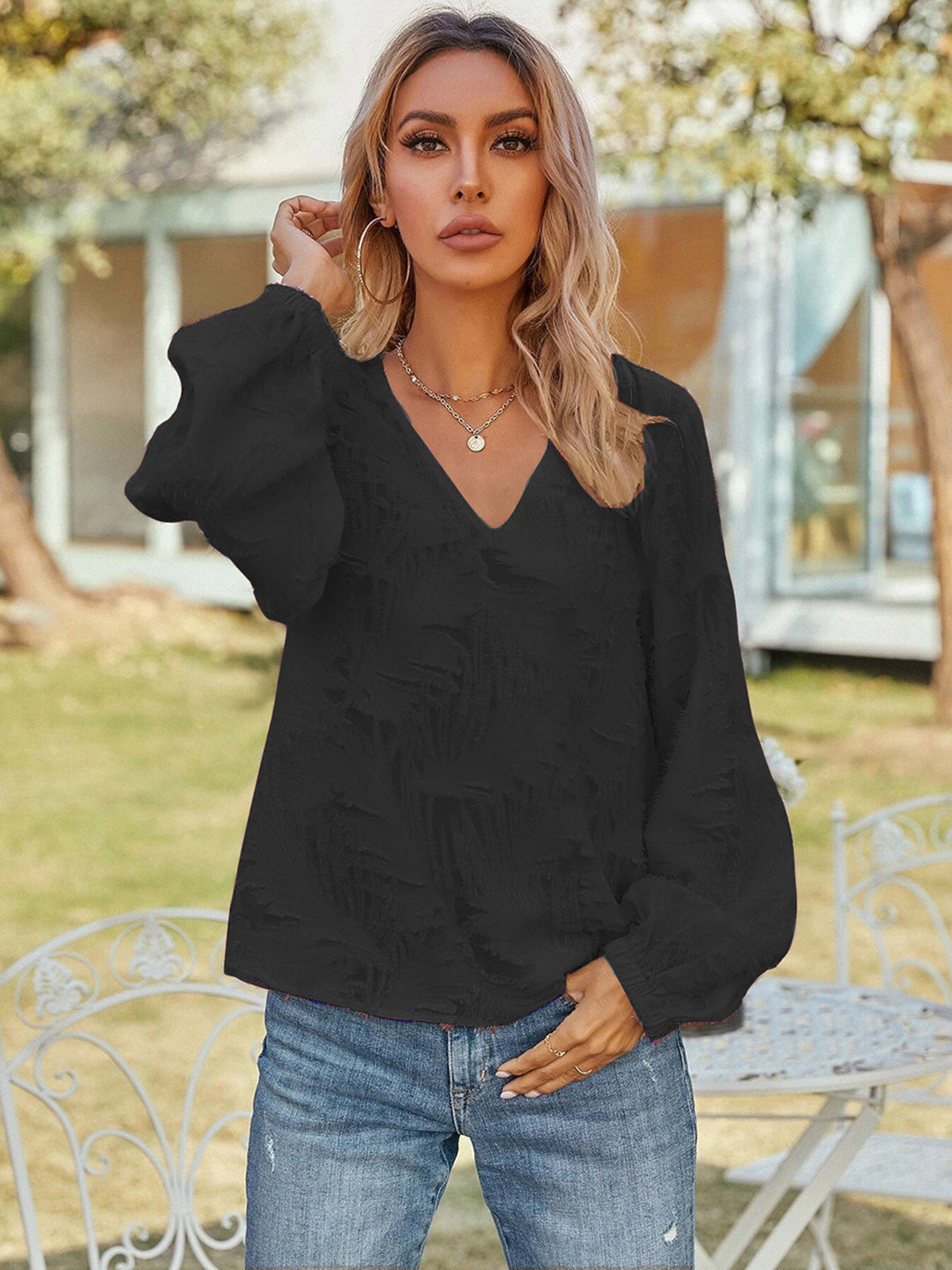 Black Textured v-neck blouse with balloon sleeves