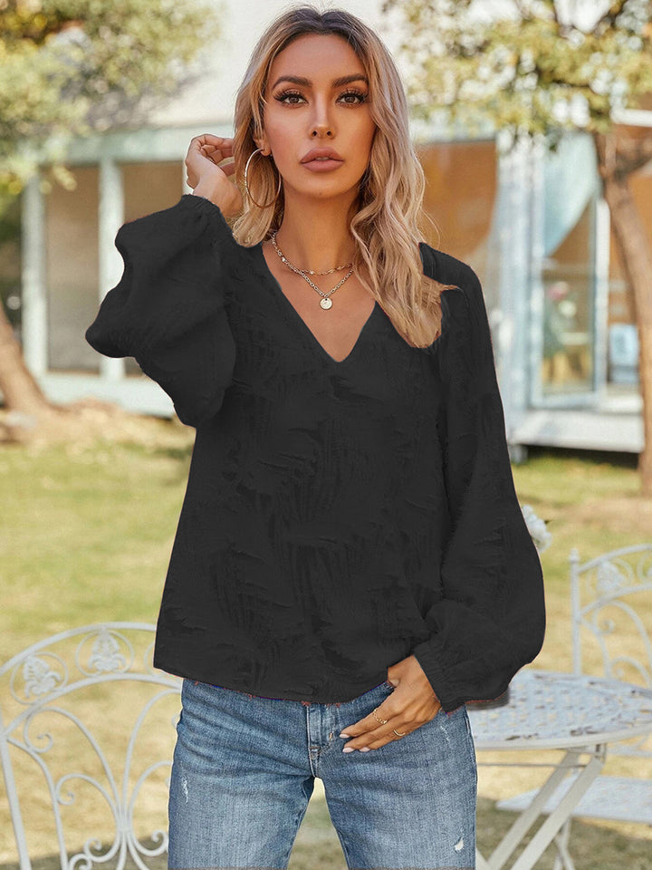 Black Textured v-neck blouse with balloon sleeves