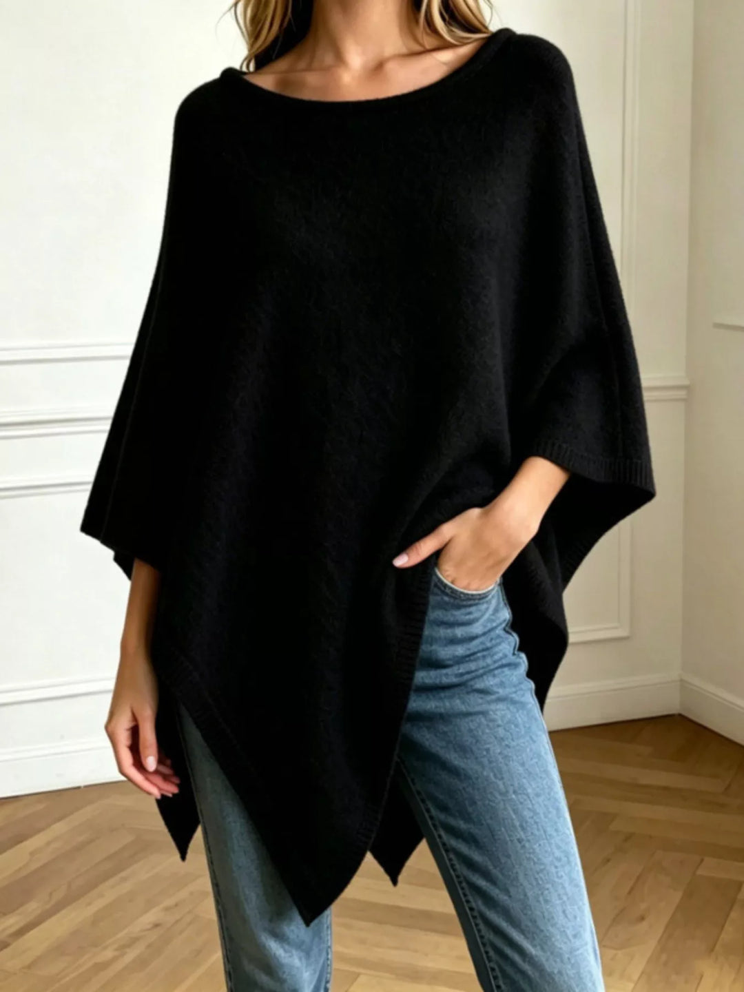 Black Asymmetrical hem textured knit poncho with ribbed crew neck