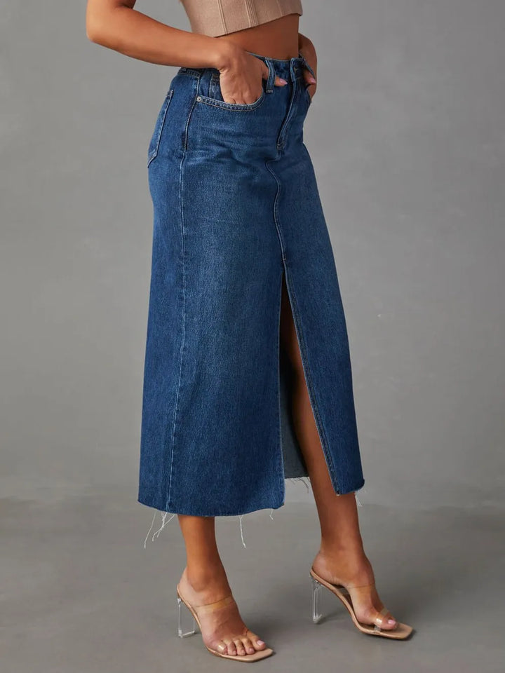 High-rise denim midi skirt with raw hem and front slit